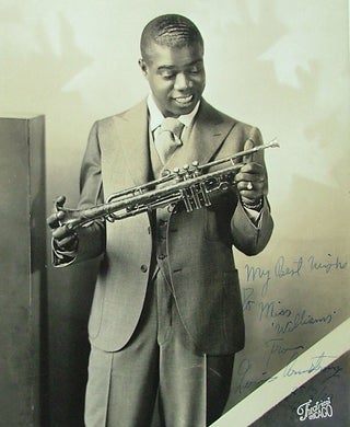 Item #313 Louis Armstrong, a beautiful signed 8" x 10" matte finish photo of young Louis, 1932